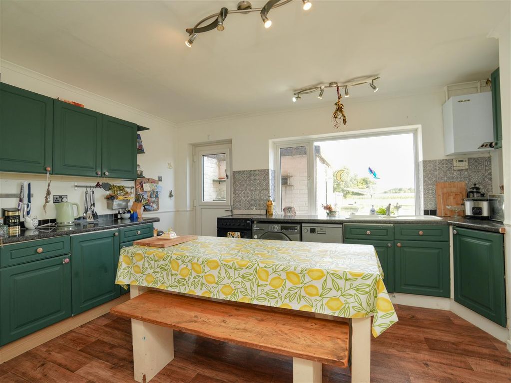 Property photo 3 of 17 Dining Kitchen