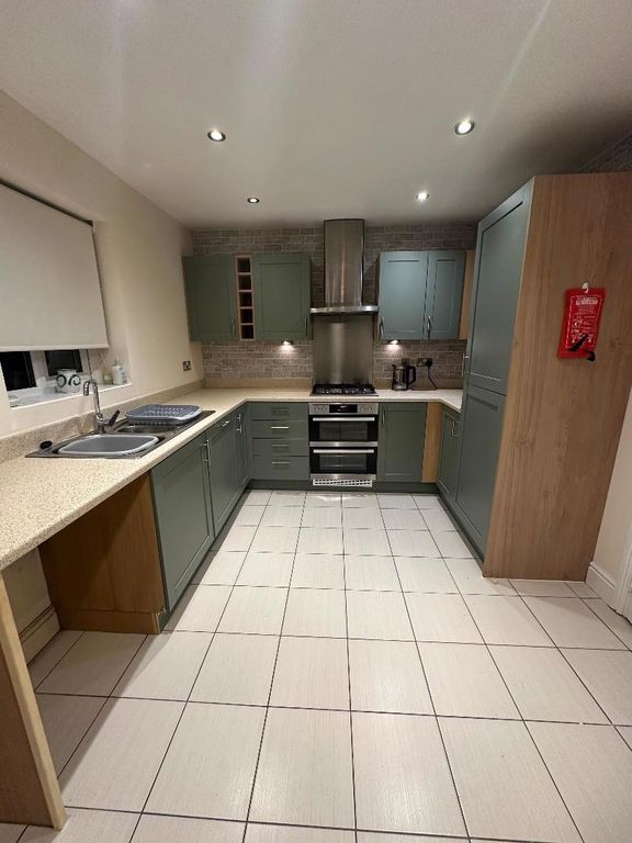 Property photo 3 of 13 Kitchen