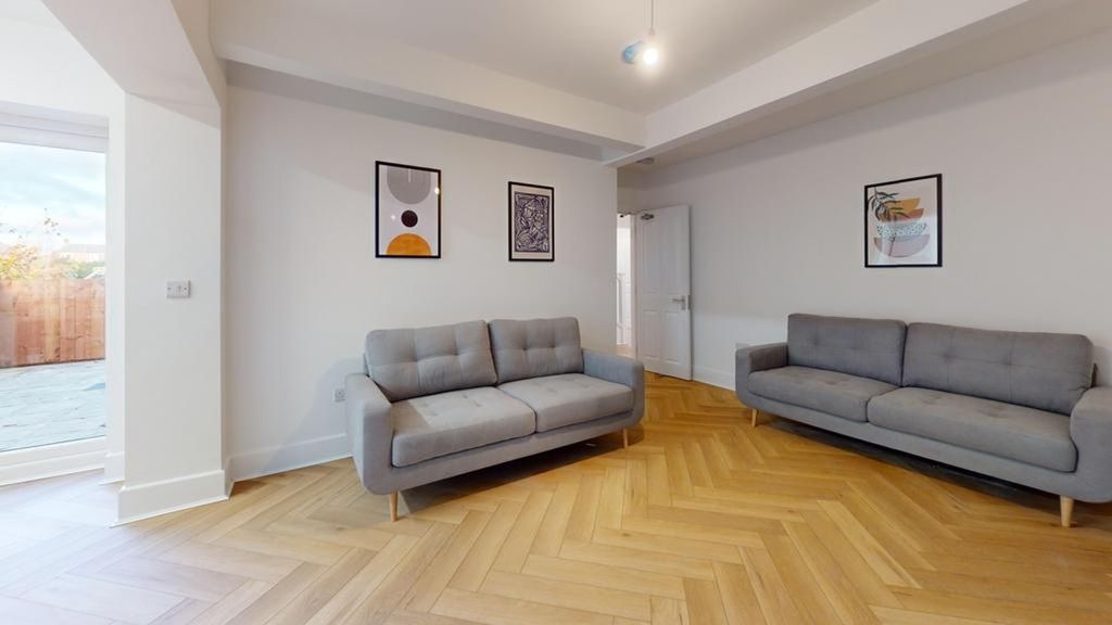 Property photo 2 of 16 A Spacious And Inviting Modern Living Room With St...
