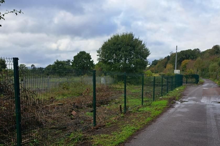 Property photo 3 of 3 A Large Plot Of Land, With Metal Fencing Around It.