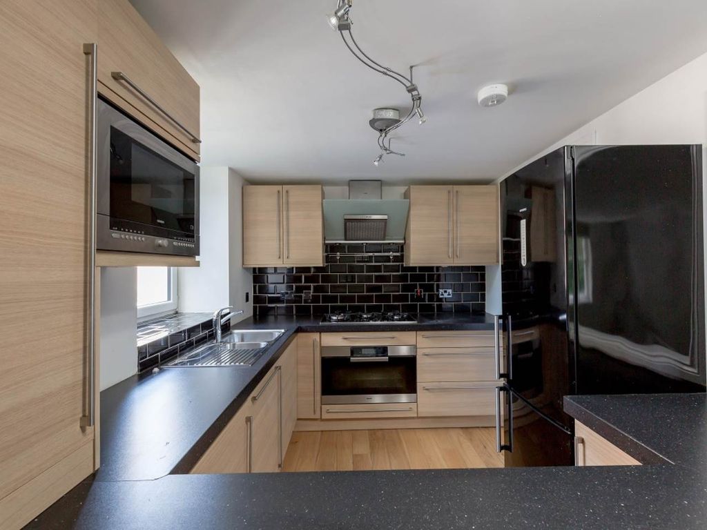 Property photo 3 of 9 Kitchen