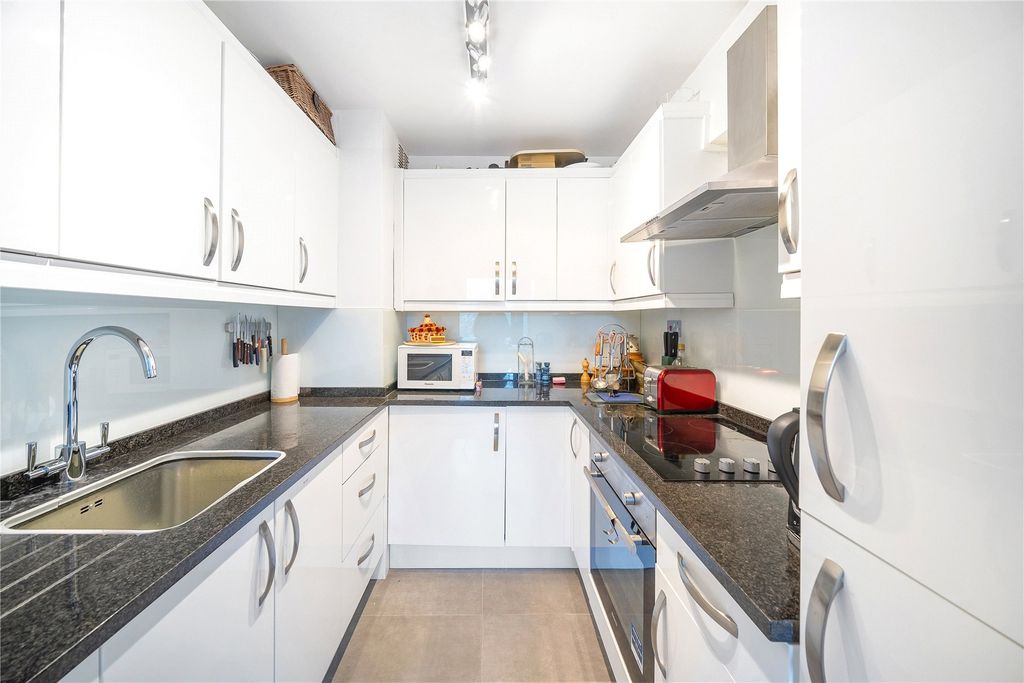 Property photo 3 of 8 Kitchen