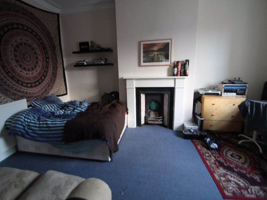 Property photo 3 of 38 A Spacious Master Bedroom Featuring A Comfortable ...