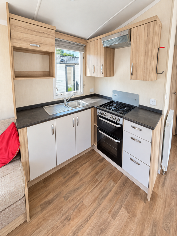 Property photo 3 of 10 Modern Fitted Kitchen With Gas Cooker, Oven And Ample Cupboard Storage