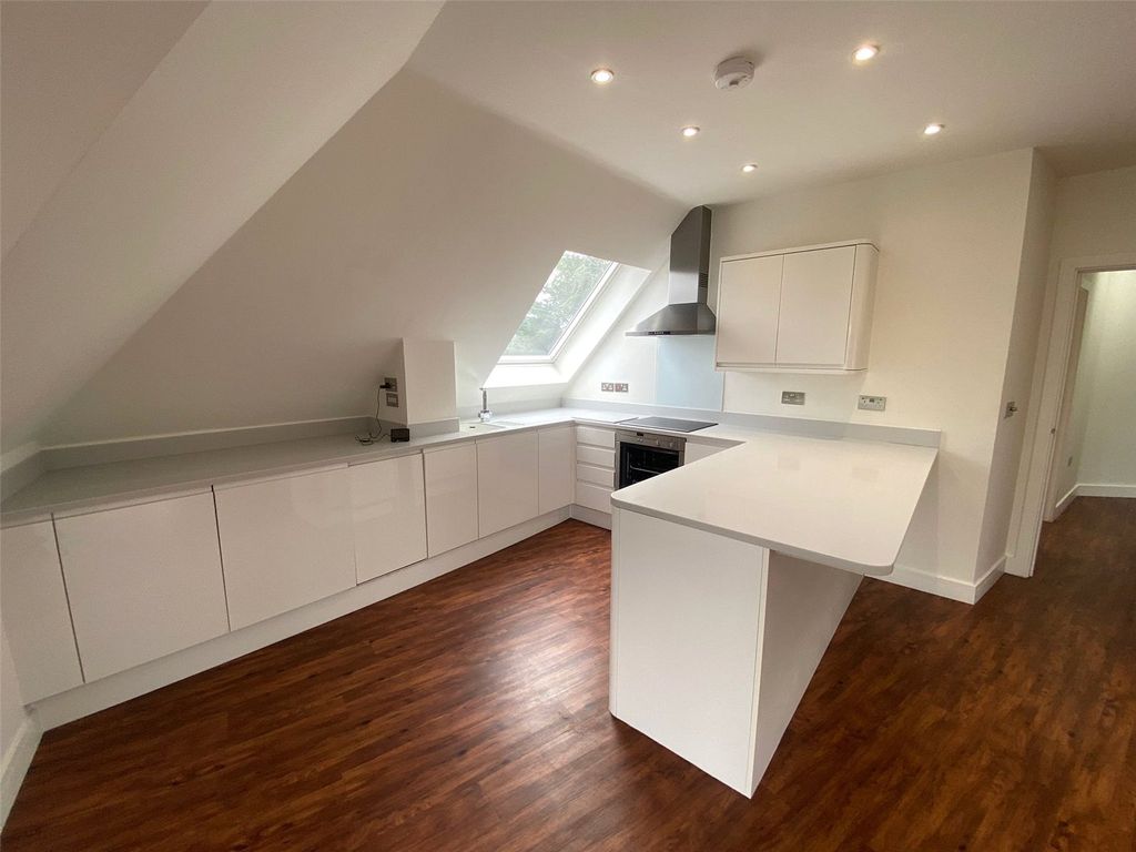 Property photo 3 of 12 Kitchen