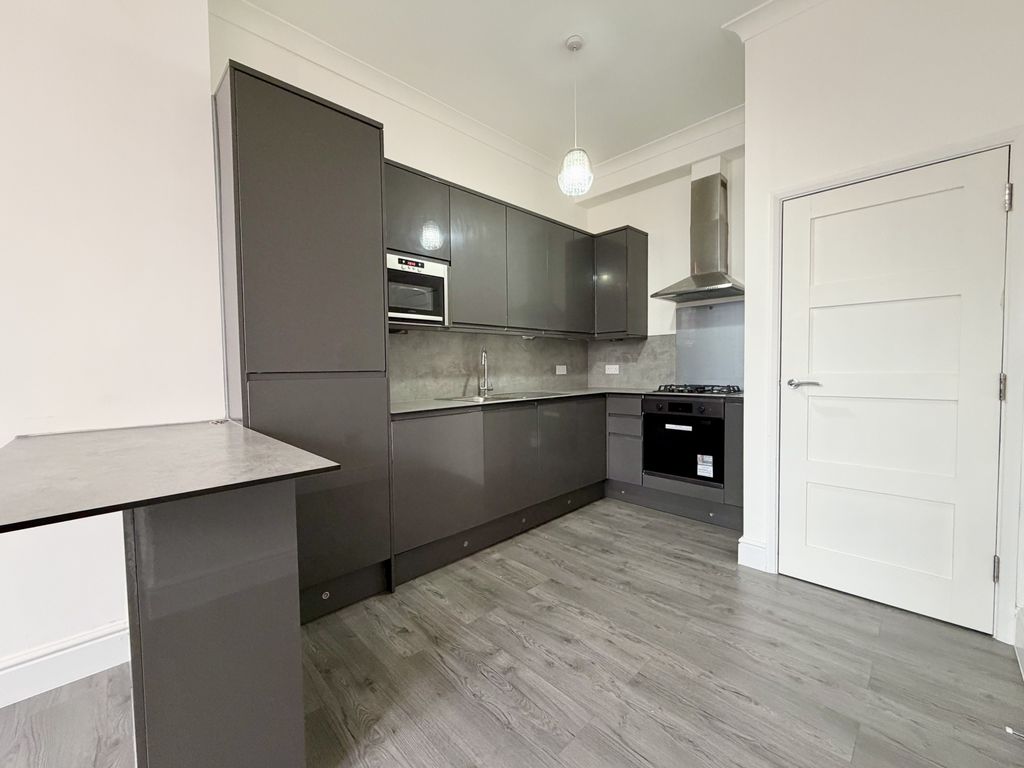 Property photo 2 of 8 Kitchen