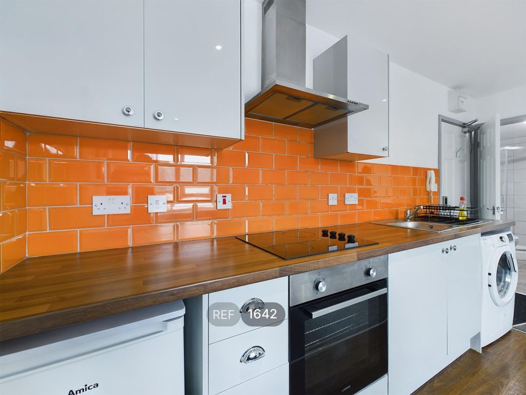 Property photo 3 of 10 Kitchen &amp; Living Area