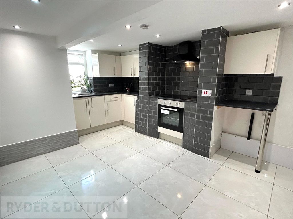 Property photo 2 of 12 Dining Kitchen