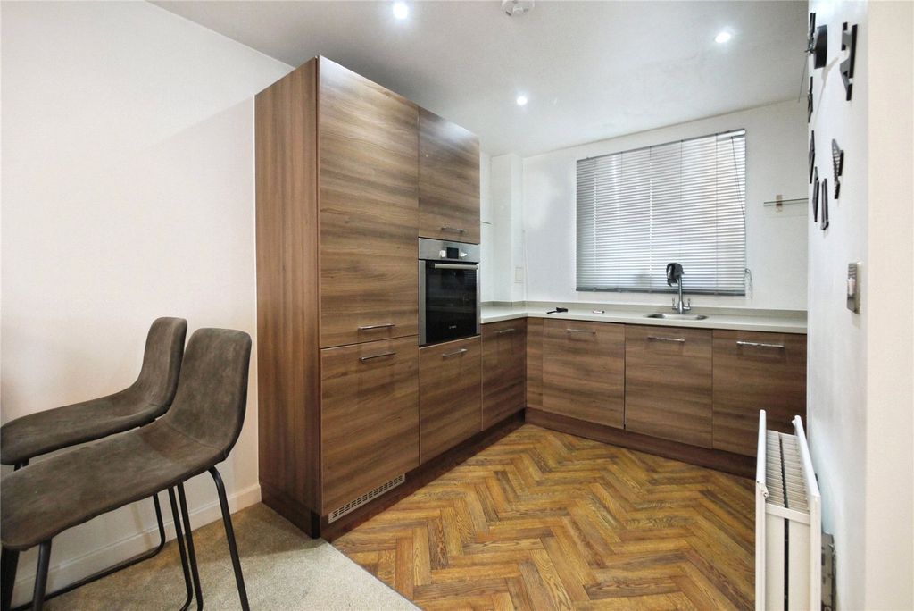 Property photo 3 of 12 Kitchen Area