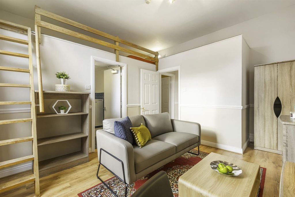Property photo 1 of 4 Modern Studio With Loft Bed And Stylish Sofa...
