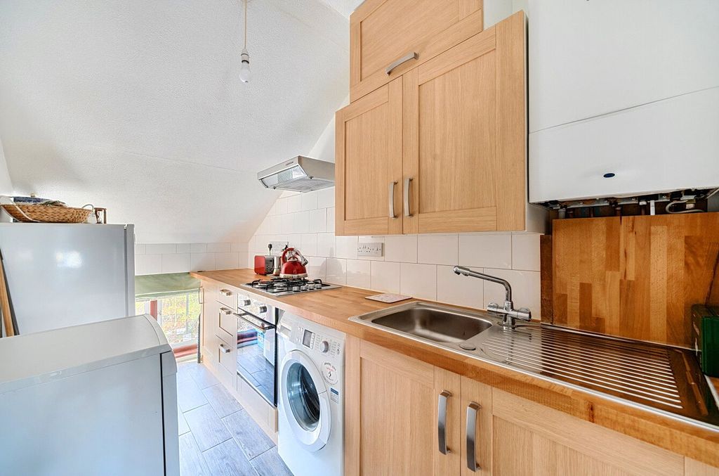 Property photo 3 of 8 Kitchen