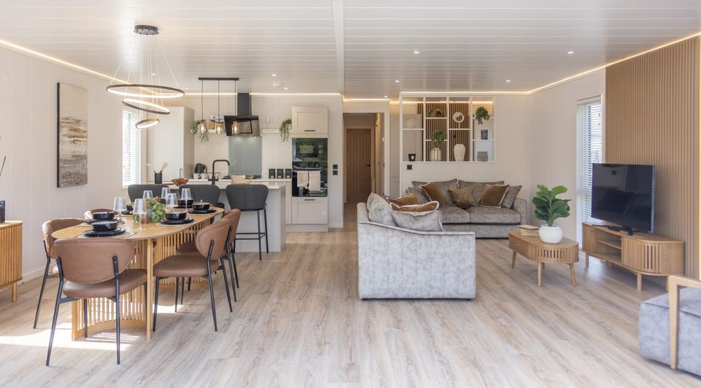 Property photo 2 of 23 Luxury Open-Plan Interior Of The Aspire Luna Lodge With Lounge, Dining Area And Modern Kitchen.
