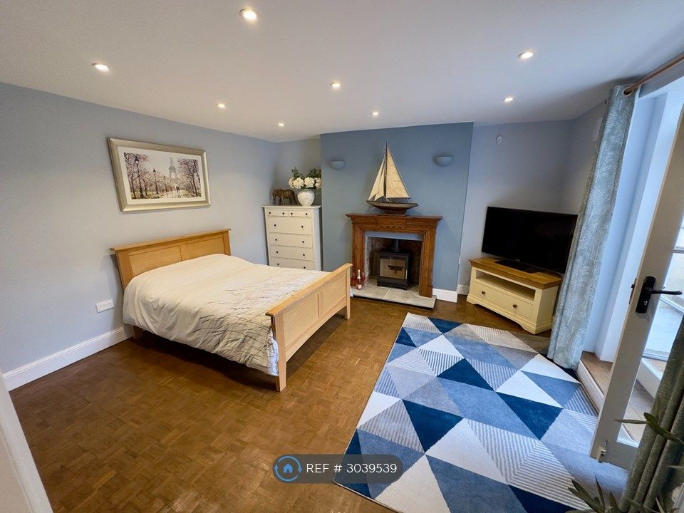 Property photo 1 of 12 Living Space With Feature Log Burner