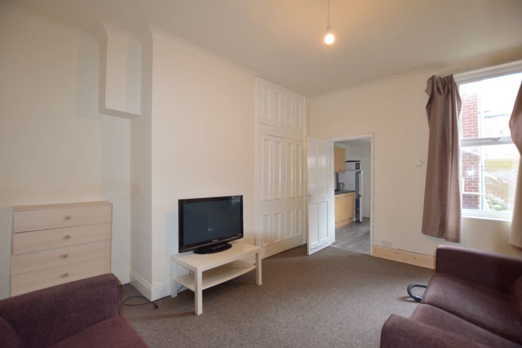 Property photo 1 of 7 A Cozy Living Room With Ample Natural Light, Perfe...