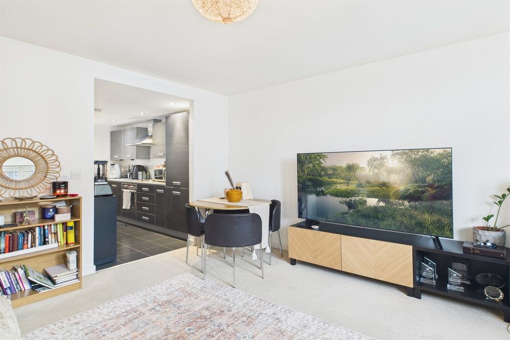 Property photo 3 of 13 Living Area