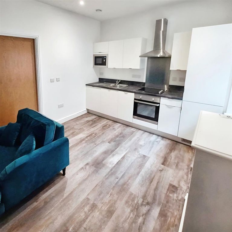 Property photo 1 of 14 Kitchen Area