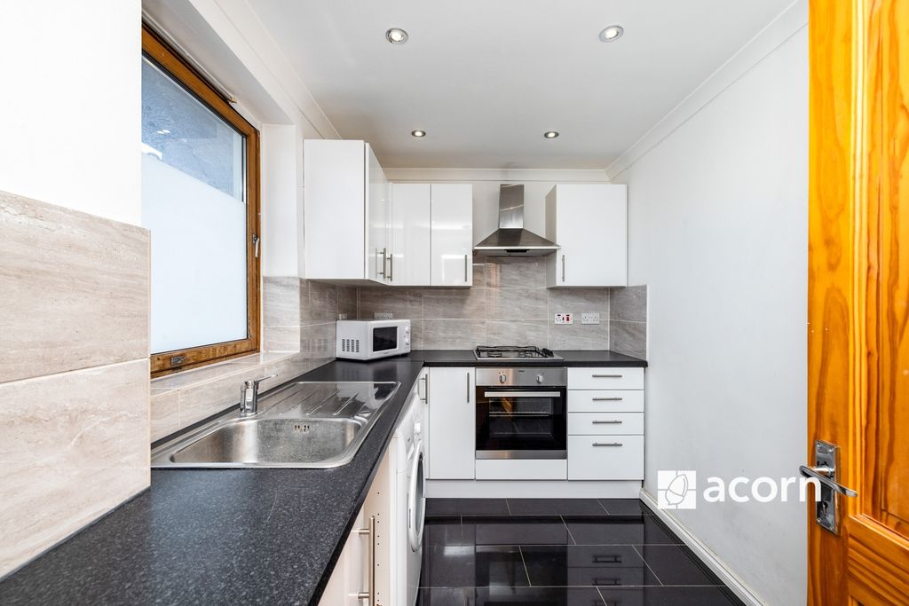 Property photo 1 of 12 Kitchen