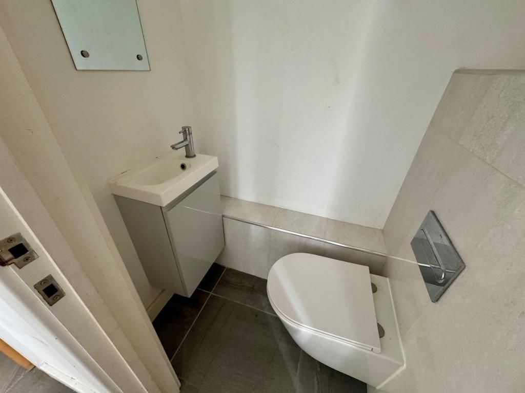 Property photo 3 of 8 Cloakroom