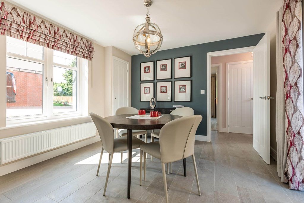 Property photo 3 of 9 A Bright And Open Breakfast Area With Doors Out To The Garden