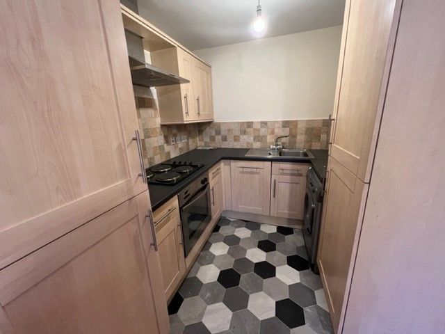 Property photo 2 of 8 Kitchen