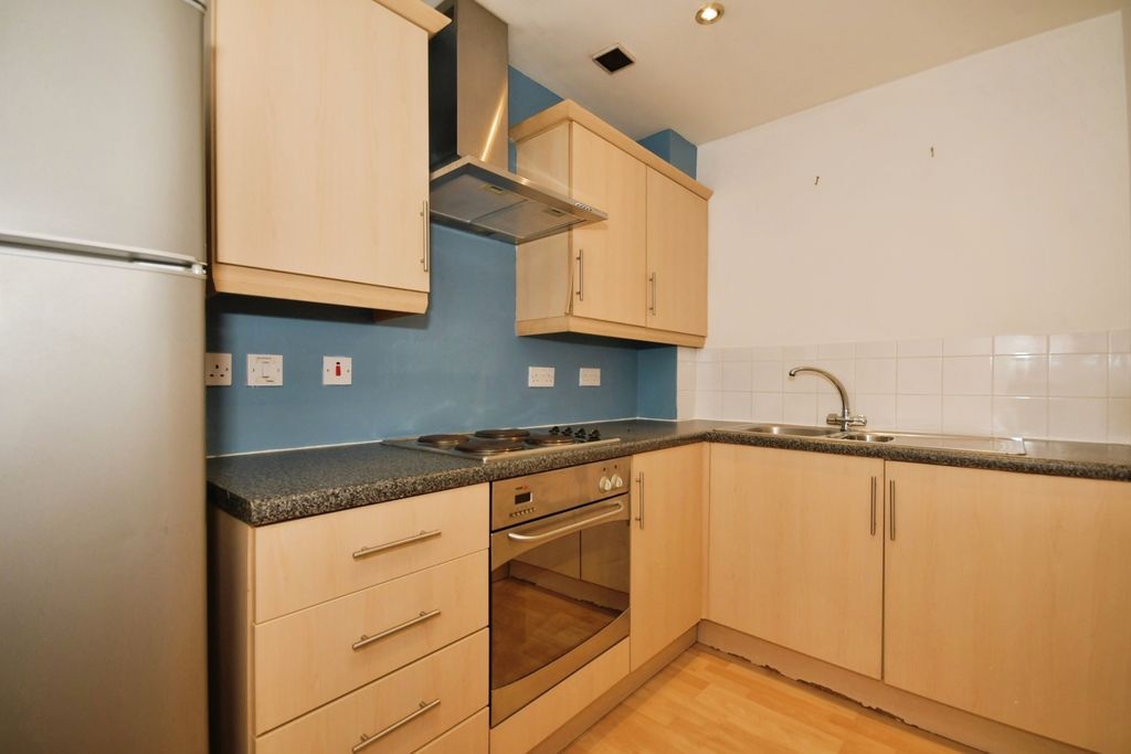 Property photo 3 of 12 Kitchen