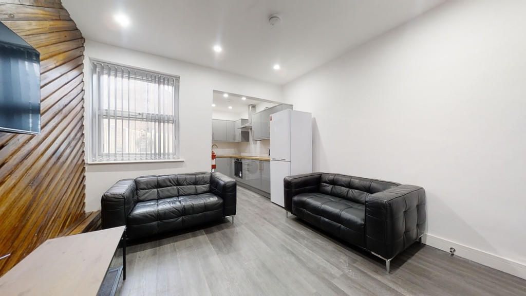 Property photo 3 of 11 Modern Living Room With Two Black Sofas, Bright Wh...