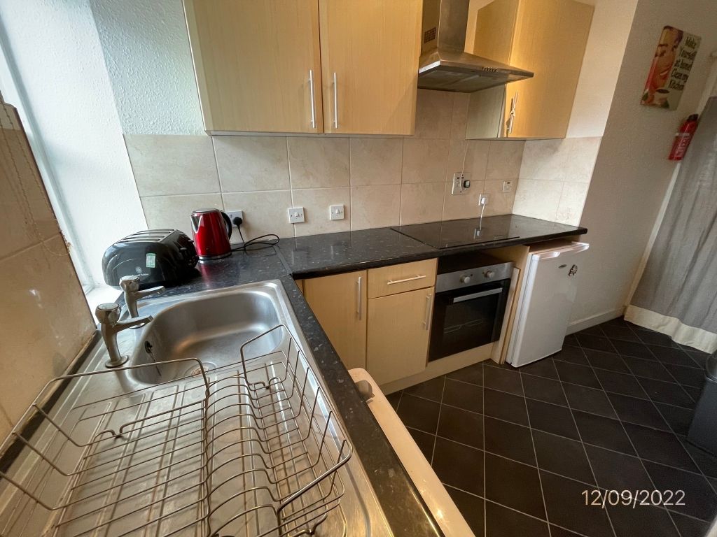 Property photo 3 of 7 Kitchen
