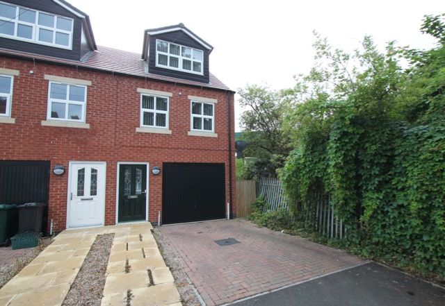 Property photo 1 of 12 Front With Driveway