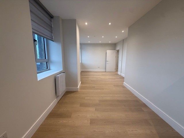 Property photo 3 of 8 Living Area