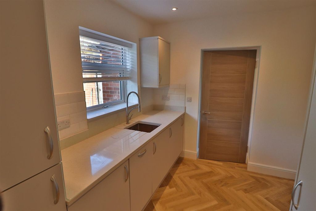 Property photo 2 of 12 Kitchen
