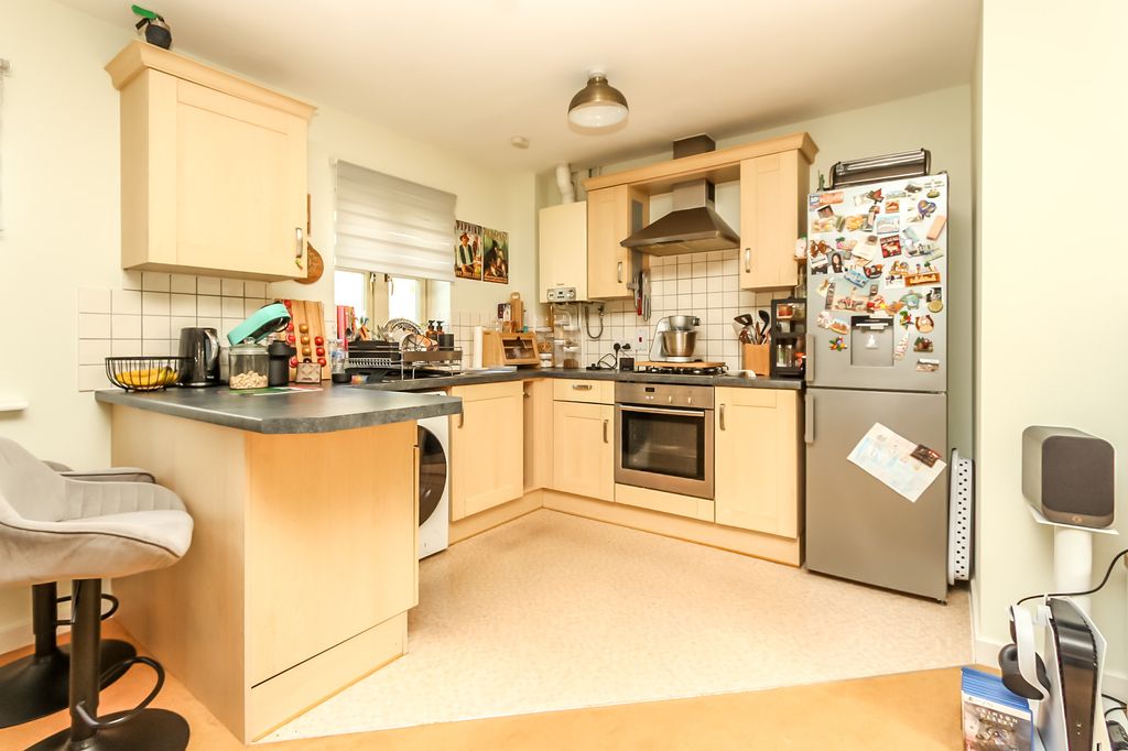 Property photo 2 of 11 Kitchen Area