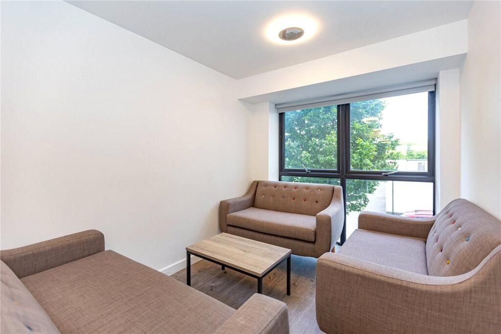 Property photo 3 of 13 Bright And Comfortable Living Room Featuring A Set...
