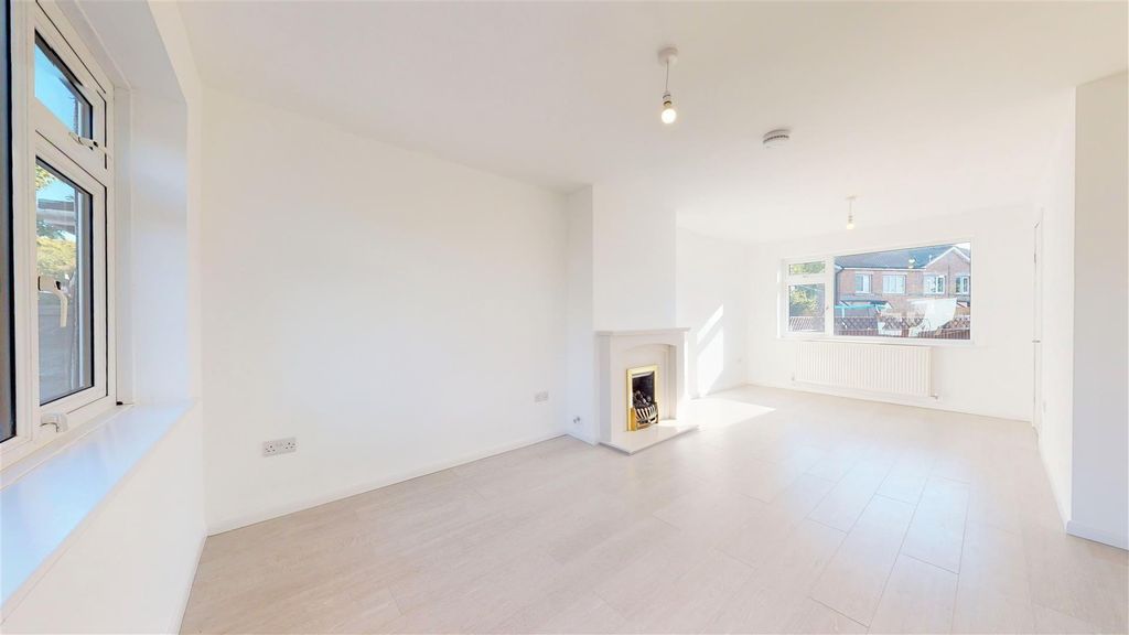 Property photo 2 of 12 Living Room 1