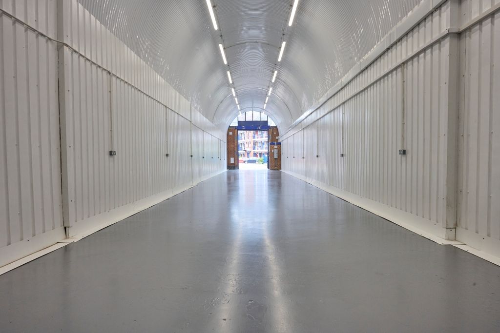 Property photo 1 of 3 An Empty Arch With Lining, Facing The Front Electric Roller Shutter Entrance, Which Is Open.