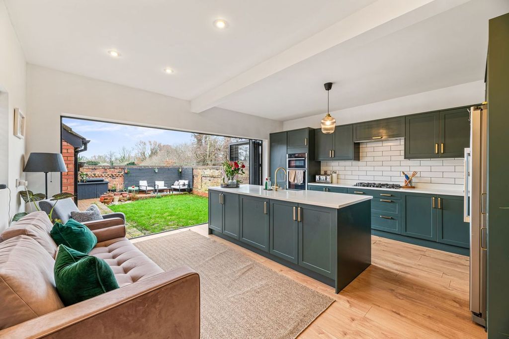 Property photo 2 of 21 Kitchen/Dining/Family Room