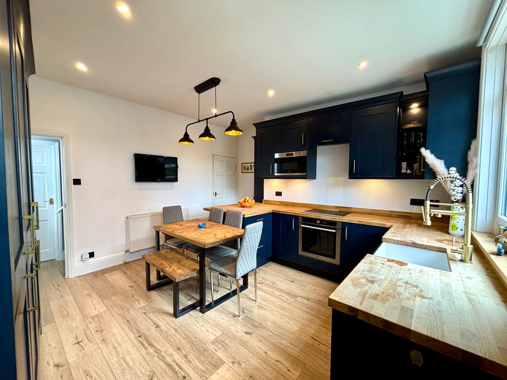 Property photo 2 of 14 Dining Kitchen