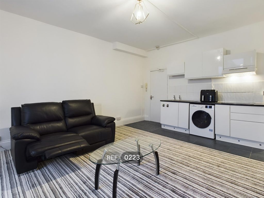 Property photo 3 of 12 Kitchen & Living Area