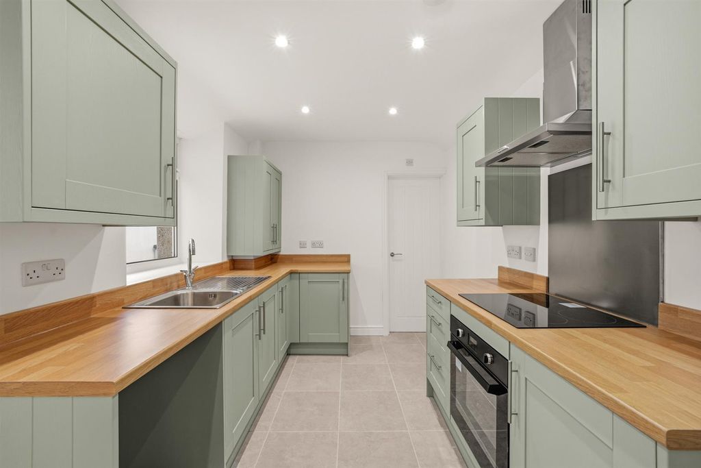 Property photo 1 of 28 Modern Sage Kitchen With Sleek Wooden Worktops...