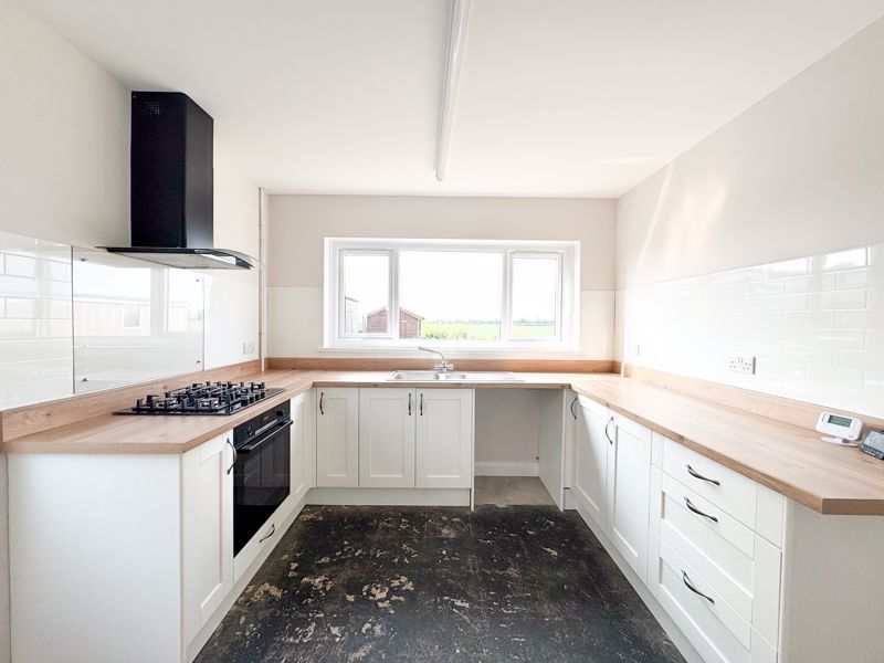 Property photo 2 of 13 Kitchen