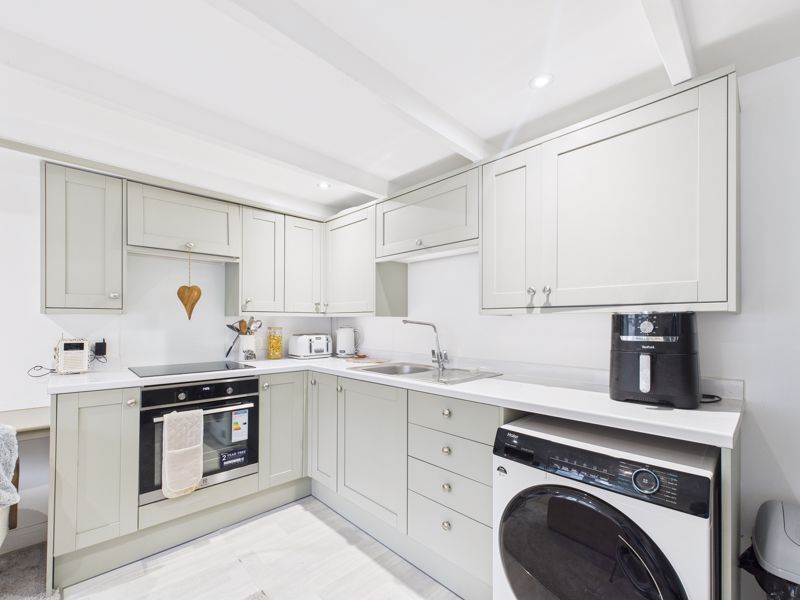 Property photo 2 of 7 Kitchen Area