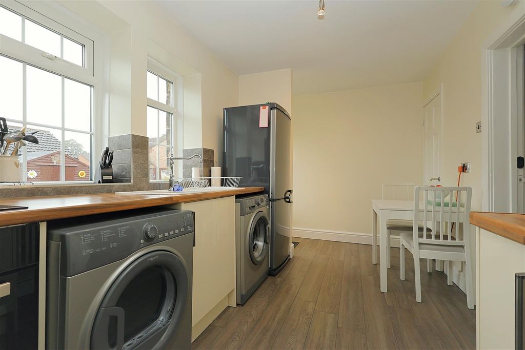 Property photo 3 of 13 Dining Kitchen