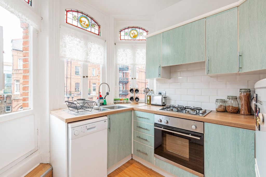 Property photo 3 of 8 Kitchen
