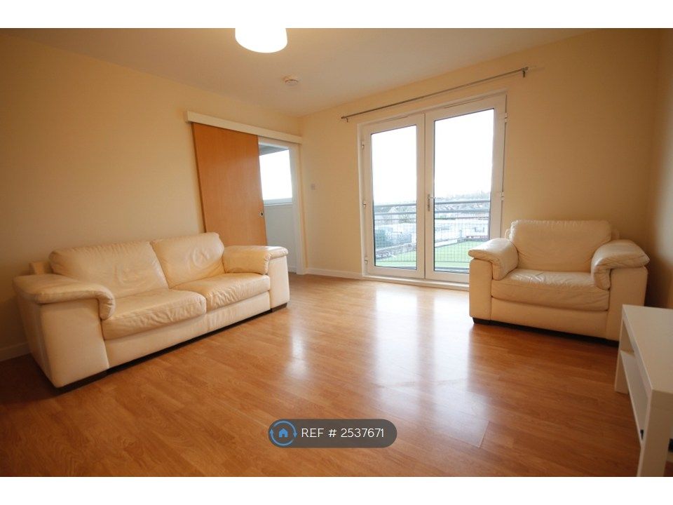Property photo 2 of 9 Livingroom With Patio Doors To Large Balcony