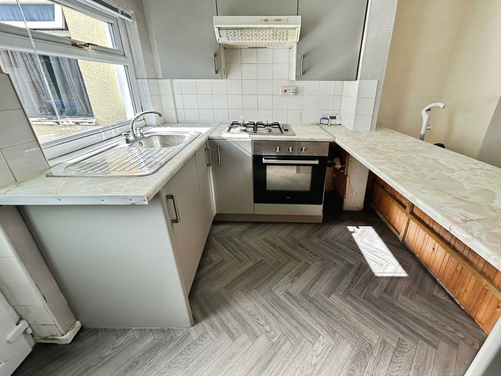 Property photo 2 of 10 Kitchen Area