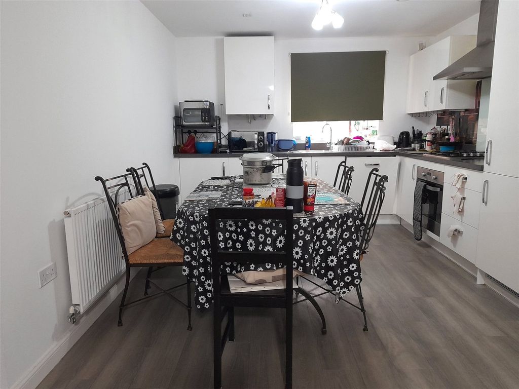 Property photo 3 of 8 Kitchen Area