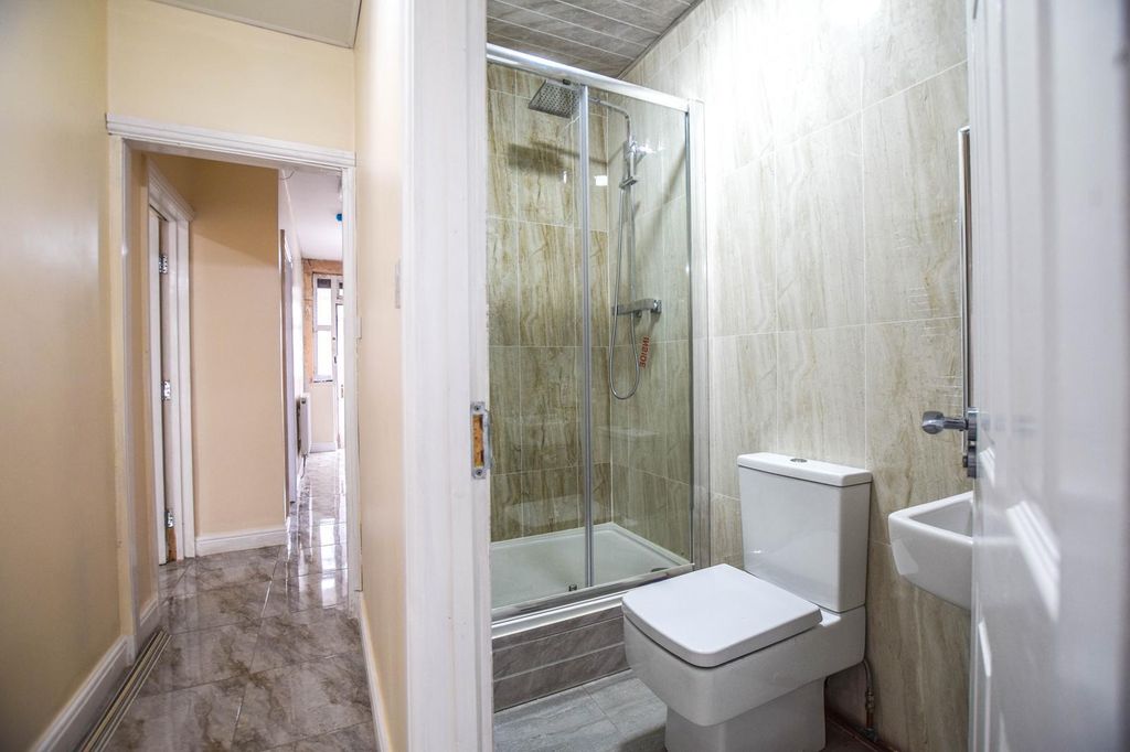Property photo 3 of 7 Downstairs Bathroom