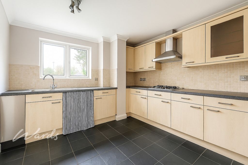 Property photo 3 of 12 Kitchen