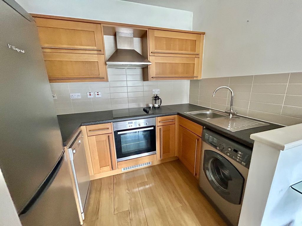 Property photo 2 of 11 Kitchen