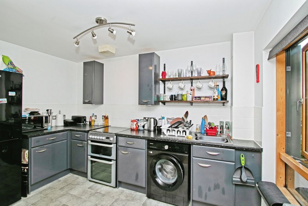 Property photo 3 of 9 Kitchen Area
