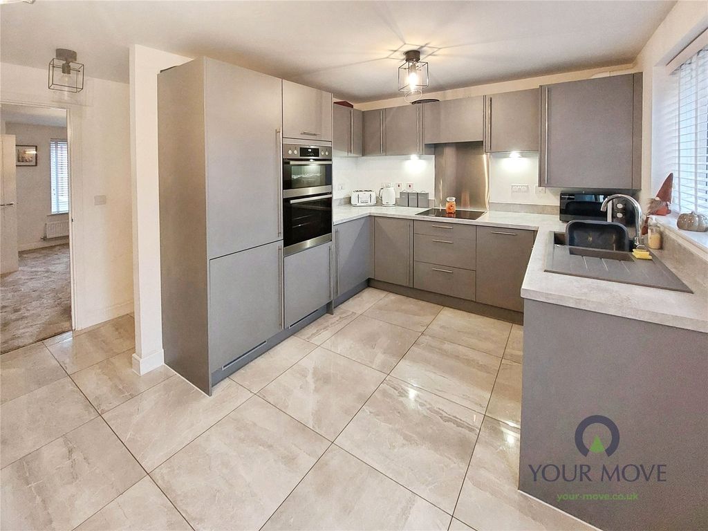 Property photo 2 of 16 Kitchen Area